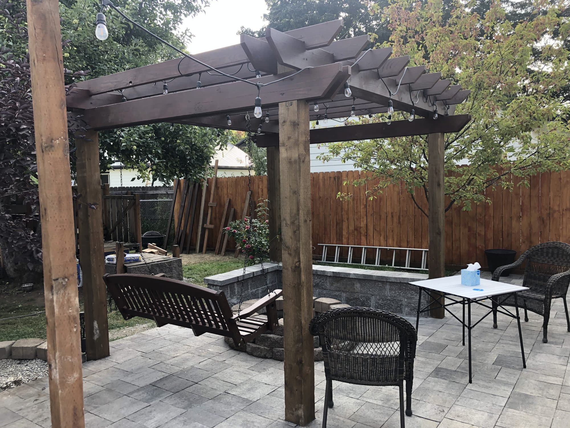 Pergola and paver patio with fire pit